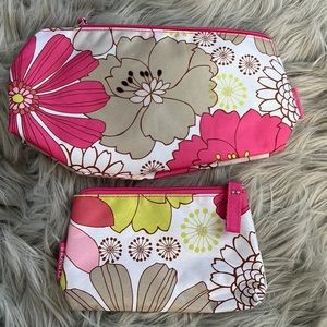 Clinique set of two make up bags and moisture surge lotion.